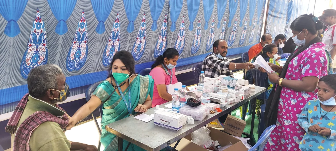 Karnataka Cancer Society medical team supporting patients at a screening camp